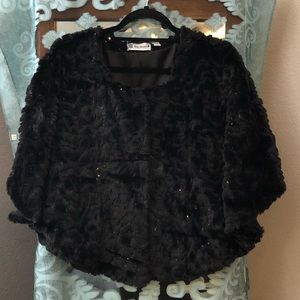 Sold on another selling platform….Sure Couture Black/Black Sequins Cape